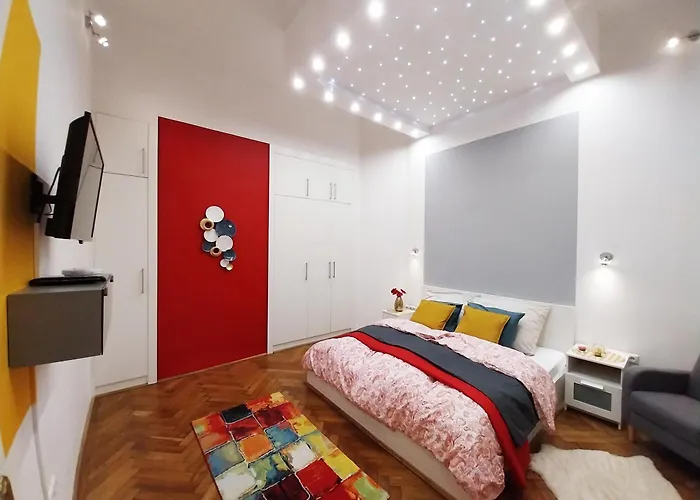King Bed And Magical Lights In The City Center